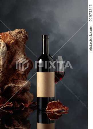 Bottle of red wine with old empty label. 92975243