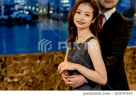 woman being hugged woman being hugged 92976345