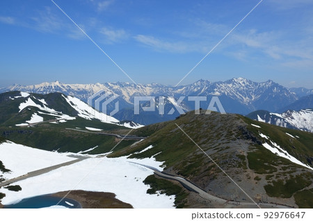 Snow-covered Hida Mountains seen from Mount Fujimi in Norikura 92976647