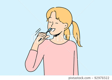 Smiling girl brushing teeth Smiling girl brushing teeth 92978322