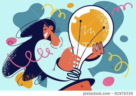 Smiling woman holding lightbulb Smiling woman holding lightbulb 92978339