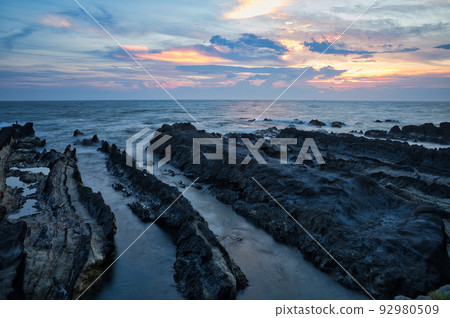 Arasaki Coast at dusk Sunset sky and beach scenery 92980509
