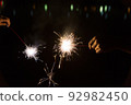 Hand-held fireworks 92982450