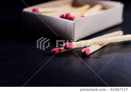 matches on a dark background.Match macro, light up, danger.Children are not allowed to use. matches on a dark background.Match macro, light up, danger.Children are not allowed to use. 92987157