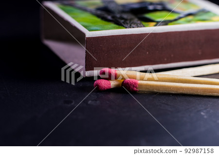 matches on a dark background.Match macro, light up, danger.Children are not allowed to use. matches on a dark background.Match macro, light up, danger.Children are not allowed to use. 92987158