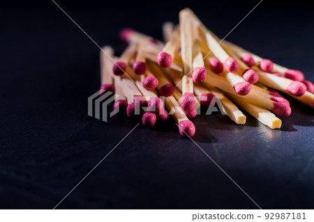 Matches, danger, fire. The concept of save the house.Closeup of matchboxes,  on dark background 92987181