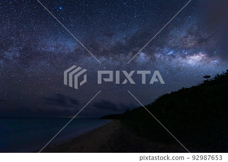 Stars and the Milky Way spread across the night sky of Ishigaki Island 92987653