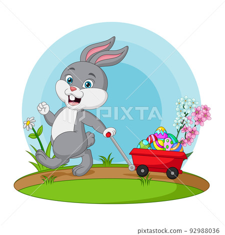 Cute little bunny carrying a cart with easter eggs 92988036