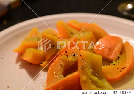 Cooked hokkaido on a plate as a closeup Cooked hokkaido on a plate as a closeup 92988389