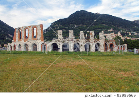 The historic arena in the center of Gubbio with the grass around 92989669
