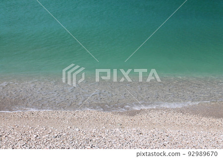 The turquoise water on the white stones of the Conero beaches 92989670