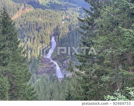The impressive water jump of Krimml falls in Austria 92989733