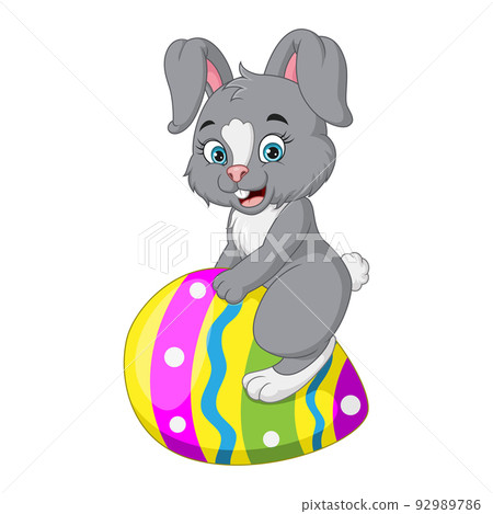 Cute little bunny sitting on easter egg 92989786