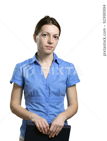 Portrait of beautiful well-groomed modest women in blue strict office dress holding book in hand on white background. Portrait of beautiful well-groomed modest women in blue strict office dress holding book in hand on white background. 92990994