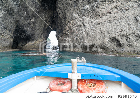 Hokkaido's blue cave seen from a fishing boat 92991579