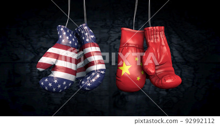 Hanging boxing gloves with the flag of the United Stats of America and the National Flag of the People's Republic of China illustrate the tensions between the two countries - 3d illustration Hanging boxing gloves with the flag of the United Stats of America and the National Flag of the People's Republic of China illustrate the tensions between the two countries - 3d illustration 92992112
