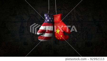 Hanging boxing gloves with the flag of the United Stats of America and the National Flag of the People's Republic of China illustrate the tensions between the two countries - 3d illustration 92992113