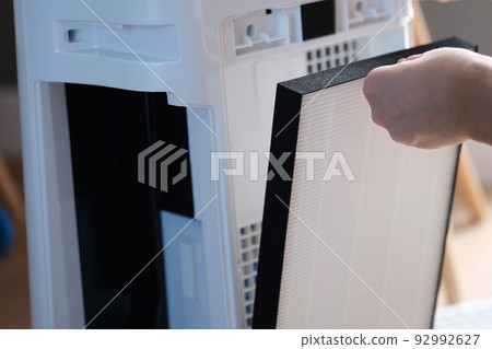 Replacing the filter in air conditioner and outdoor air purifier 92992627