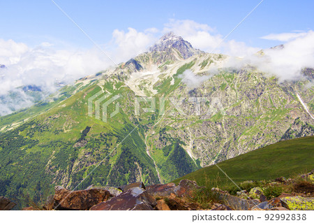 The Caucasus Mountains. Mountain peaks in summer. The Caucasus Mountains. Mountain peaks in summer. 92992838