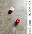 Red apple on a beige background. Top view photography. 92994918