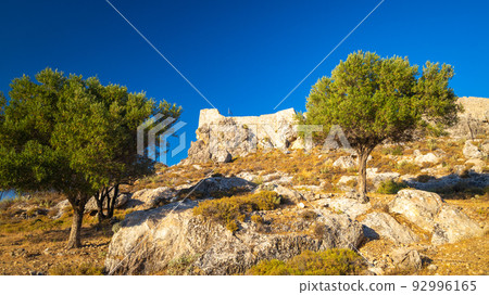 Ruins of the castle of St. John in The Archangelos town in the island of Rhodes. 92996165