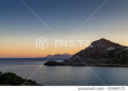 A view of the east coast of the island of Rhodes at sunset. A view of the east coast of the island of Rhodes at sunset. 92996172
