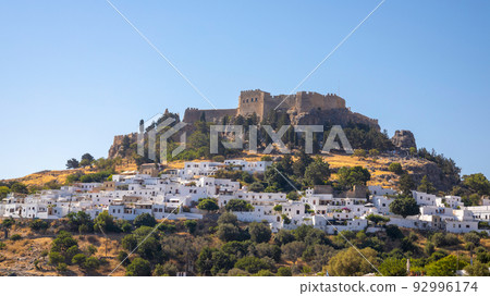 Lindos town with the Acropolis on Rhodes island, Greece. 92996174