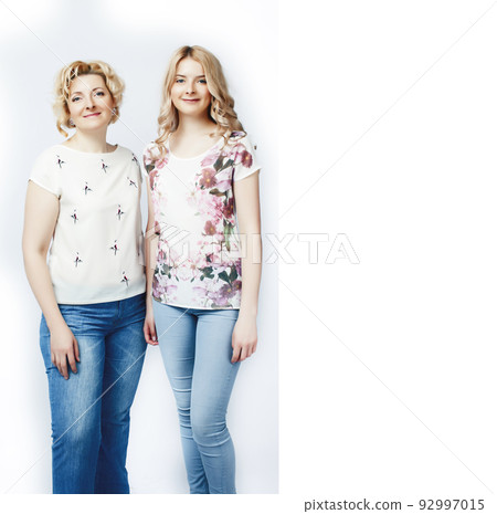mother with daughter together posing happy smiling isolated on white background with copyspace, lifestyle people concept close up mother with daughter together posing happy smiling isolated on white background with copyspace, lifestyle people concept close up 92997015