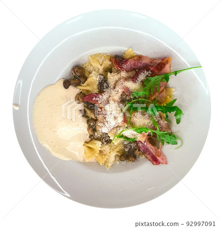 Pasta carbonara in a white plate isolated 92997091
