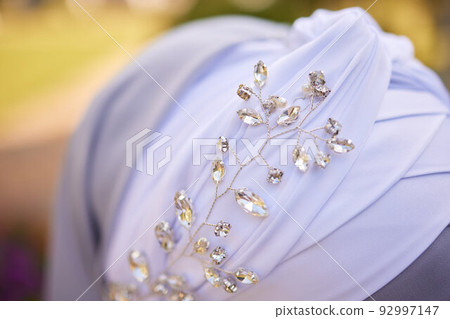 Bride and groom Asian Muslims marry in a beautiful red love theme. celebration nikah day. Bride and groom Asian Muslims marry in a beautiful red love theme. celebration nikah day. 92997147