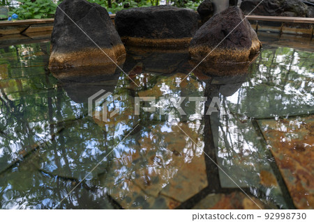 Open-air bath, hot spring water 92998730