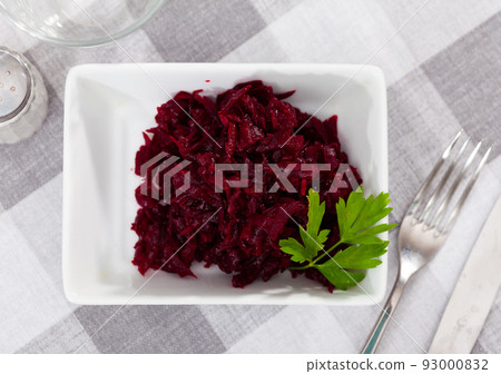 Portion of salad made of boiled and grated beetroot Portion of salad made of boiled and grated beetroot 93000832