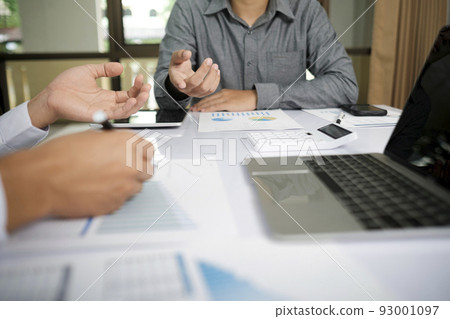 Close up asisan businessman teamwork meeting and discussing the investment data and report graph. Close up asisan businessman teamwork meeting and discussing the investment data and report graph. 93001097