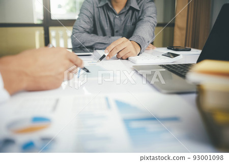 Close up asisan businessman teamwork meeting and discussing the investment data and report graph. Close up asisan businessman teamwork meeting and discussing the investment data and report graph. 93001098