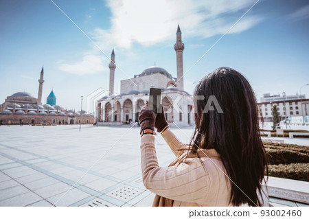 woman taking picture of beautiful mosque in konya turkey woman taking picture of beautiful mosque in konya turkey 93002460