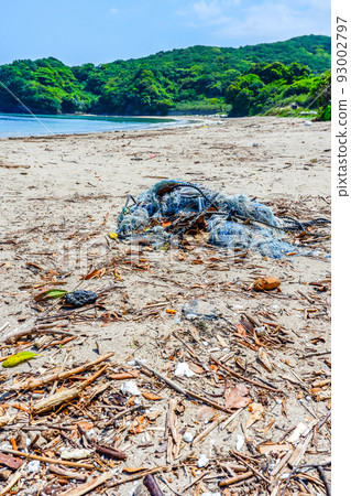 Sandy beach full of garbage Sandy beach full of garbage 93002797
