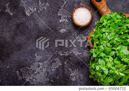 Cooking background with basil and different spices Cooking background with basil and different spices 93004732