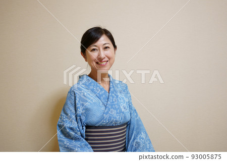 A middle-aged woman wearing a yukata (luxury yukata silk red plum) casually dressed without a half-collar 93005875