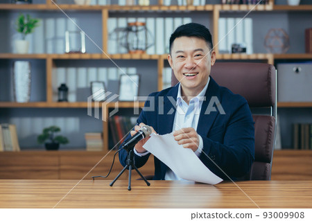 Portrait of Asian blogger, man recording sound on torn paper microphone, asmr sound 93009908