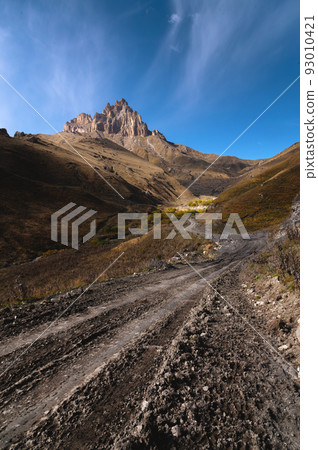 Autumn day on a scenic but difficult 4X4 track located in front of the summit. Off-road, wide angle 93010421