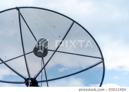 A Satellite dish on roof in blue sky with cloud Background A Satellite dish on roof in blue sky with cloud Background 93012404