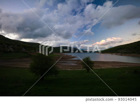 sunset Landscape of Mavrovo national park with mountain,lake and new St Nikola church, FYR Macedonia sunset Landscape of Mavrovo national park with mountain,lake and new St Nikola church, FYR Macedonia 93014045