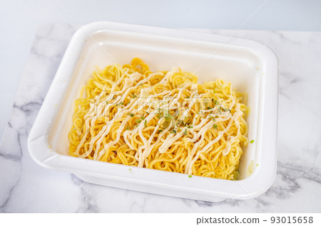 Salt fried noodles in a cup with green seaweed 93015658