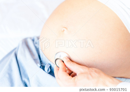 Doctor stethoscope patient pregnancy woman. Medical clinic for pregnant consultant. Doctor examining pregnancy woman belly holding stethoscope. Concept maternity, pregnancy, childbirth. Doctor stethoscope patient pregnancy woman. Medical clinic for pregnant consultant. Doctor examining pregnancy woman belly holding stethoscope. Concept maternity, pregnancy, childbirth. 93015701