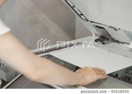A woman taking a copy A woman taking a copy 93016030