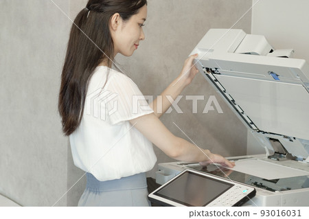 A woman taking a copy A woman taking a copy 93016031