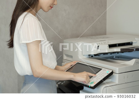 Woman taking a copy photo material Woman taking a copy photo material 93016032