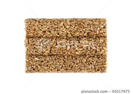 Top view of kozinaki tiles isolated on white background. Kozinaki is an oriental sweet made from peeled seeds mixed with molasses. Top view of kozinaki tiles isolated on white background. Kozinaki is an oriental sweet made from peeled seeds mixed with molasses. 93017975