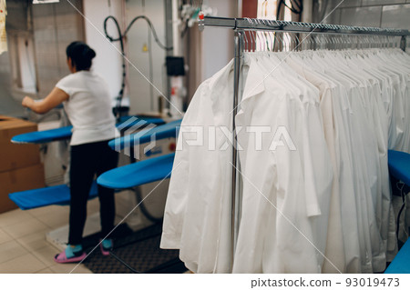 Dry cleaning shirts clothes. Clean cloth chemical process. Laundry industrial dry-cleaning. 93019473