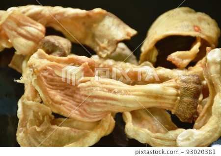 crispy fried duck innards on plate dipping with sweet black soy sauce 93020381